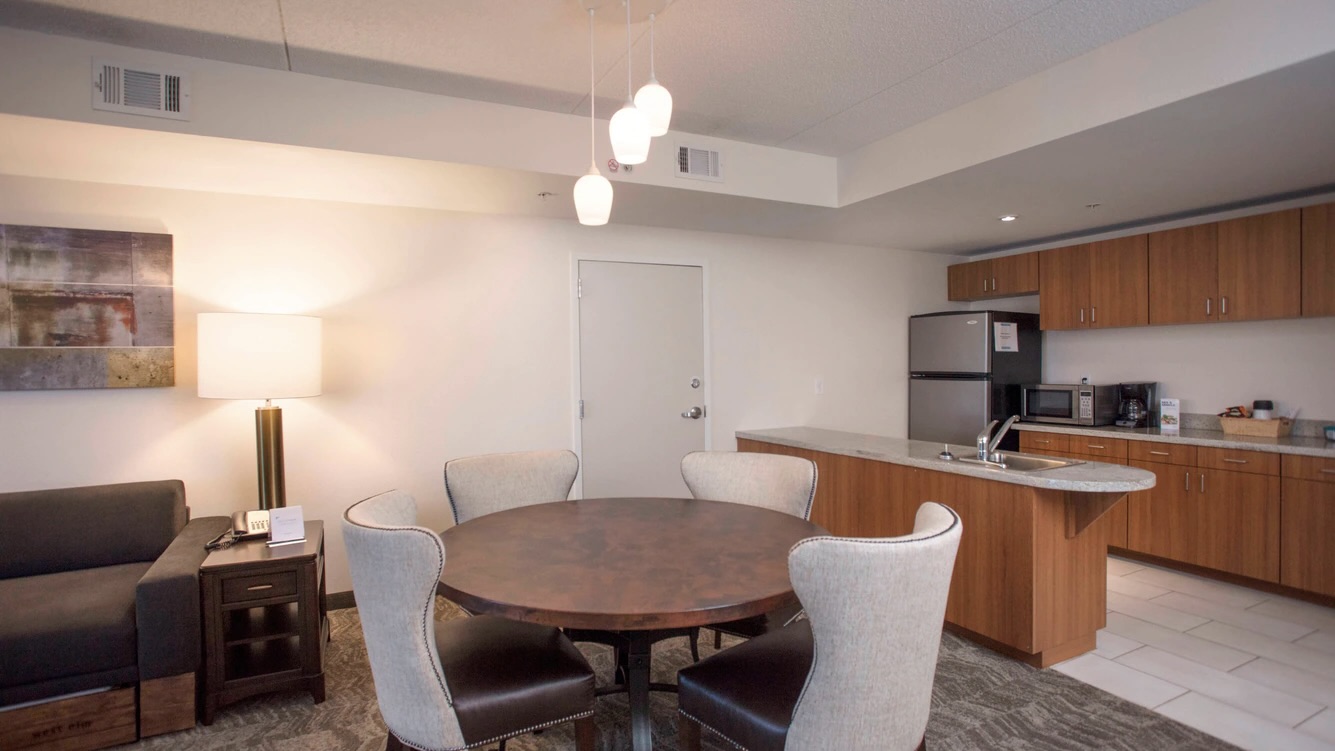 SpringHill Suites by Marriott Athens West presidential suite kitchen and table.jpg
